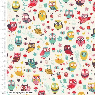 Craft Cotton Happy Owls Flying Multi coloured on a white background fabric. Bright Quilting